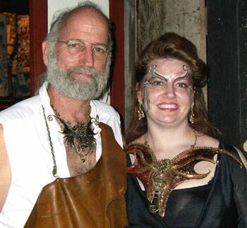 David Spurlock, the artist, with customer in dragon chestplate.